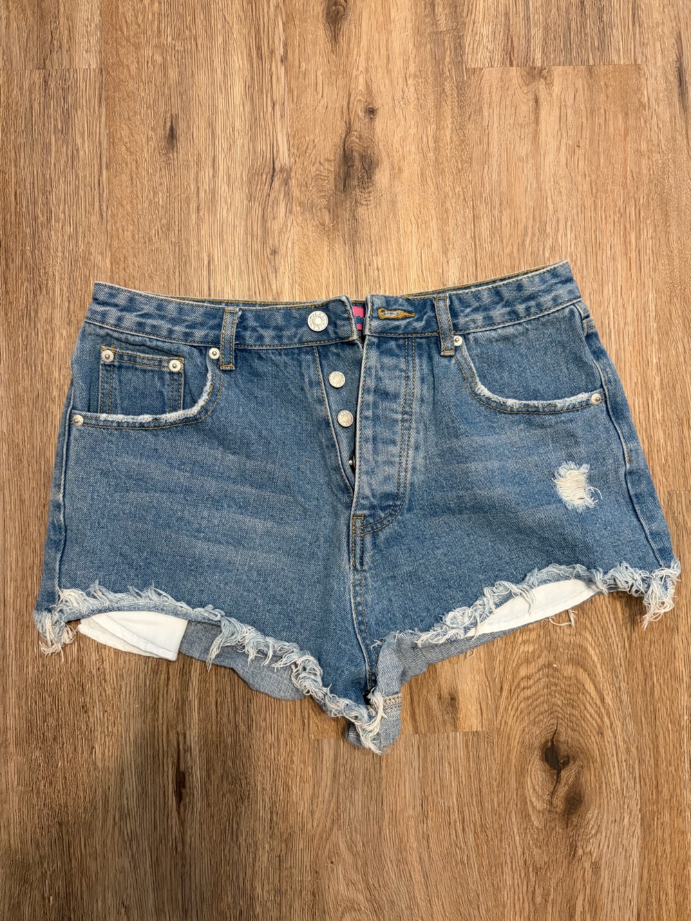 Women’s Edikted Frayed Light Blue Denim Button-Up Shorts
